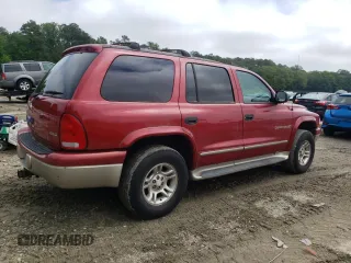 2001 Dodge Durango z VIN 1B4HS28N91F507032, wystawiony jako Copart lot #57110765 z przebiegiem 103 105 mil mil oraz Tytuł czysty. Historia ofert i sprzedaży dostępna na DreamBid. Obrazek 3.