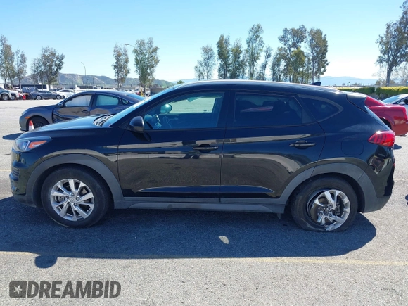 2021 Hyundai Tucson Value z VIN KM8J33A43MU306697, wystawiony jako IAAI lot #41869100 z przebiegiem 129 776 mil mil oraz . Historia ofert i sprzedaży dostępna na DreamBid. Obrazek 14.