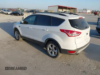 2016 Ford Escape SE with VIN 1FMCU9GX0GUC03719, listed as a IAAI auction lot 41781963 with 85,382 mi miles. Bid and sale history available at carsss.com. Image 3.