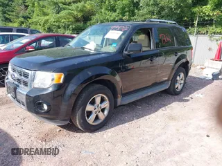 2010 Ford Escape Limited z VIN 1FMCU9EG0AKC58211, wystawiony jako IAAI lot #42697302 z przebiegiem 166 337 mil mil oraz . Historia ofert i sprzedaży dostępna na DreamBid. Obrazek 2.