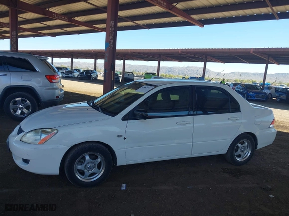 2004 Mitsubishi Lancer ES with VIN JA3AJ26E14U065498, listed as a IAAI auction lot 41887945 with 142,632 mi miles. Bid and sale history available at carsss.com. Image 14.
