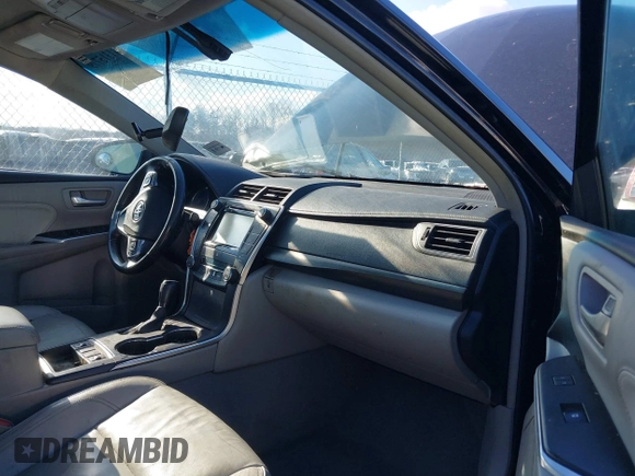2017 Toyota Camry Hybrid LE with VIN 4T1BD1FK9HU203089, listed as a IAAI auction lot 41315779 with 87,630 mi miles. Bid and sale history available at carsss.com. Image 5.