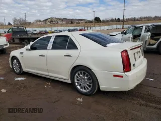 2010 Cadillac STS AWD z VIN 1G6DU6EV1A0150801, wystawiony jako Copart lot #42761515 z przebiegiem 154 865 mil mil oraz Szkoda całkowita • Salvage title. Historia ofert i sprzedaży dostępna na DreamBid. Obrazek 2.