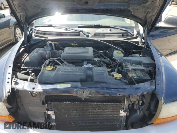 2003 Dodge Dakota SLT z VIN 1D7HL42N33S237980, wystawiony jako Copart lot #55276095 z przebiegiem 97 471 mil mil oraz Tytuł czysty. Historia ofert i sprzedaży dostępna na DreamBid. Obrazek 11.