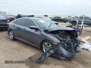 2017 Honda Civic Sedan LX with VIN 2HGFC2F63HH563674, listed as a IAAI auction lot 41633602 with 1 mi miles. Bid and sale history available at carsss.com. Image 1.