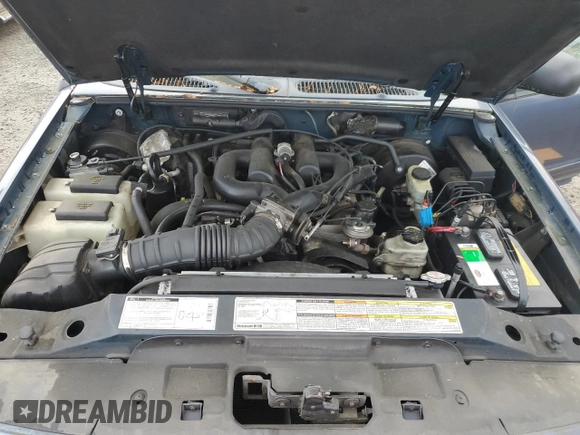1999 Ford Explorer XL with VIN 1FMDU32E7XUC25465, listed as a Copart auction lot 83651354 with 93,850 mi miles and Clean title. Bid and sale history available at DreamBid. Image 12.