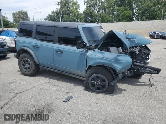 2022 Ford Bronco with VIN 1FMEE5DP4NLB75249, listed as a Copart auction lot 51797915 with 55,347 mi miles and Salvage Title. Bid and sale history available at DreamBid. Image 4.