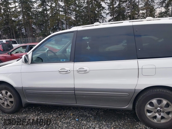 2005 Kia Sedona LX with VIN KNDUP132X56742698, listed as a IAAI auction lot 41637967 with 118,346 mi miles. Bid and sale history available at carsss.com. Image 15.