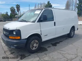 2005 Chevrolet Express Cargo Van with VIN 1GCHG35U651127686, listed as a IAAI auction lot 42028915 with 357,912 mi miles. Bid and sale history available at carsss.com. Image 2.
