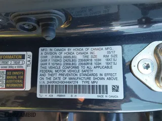 2017 Honda CR-V Touring with VIN 2HKRW2H90HH647274, listed as a IAAI auction lot 41572666 with 95,264 mi miles. Bid and sale history available at carsss.com. Image 9.