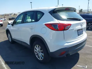 2016 Mazda CX-5 Sport with VIN JM3KE2BY9G0825285, listed as a IAAI auction lot 41841833 with 96,915 mi miles. Bid and sale history available at carsss.com. Image 3.