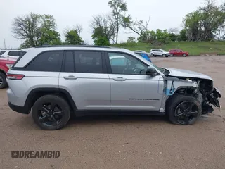 2023 Jeep Grand Cherokee Altitude with VIN 1C4RJHAG8PC611840, listed as a IAAI auction lot 42336992 with 41,100 mi miles and . Bid and sale history available at DreamBid. Image 14.