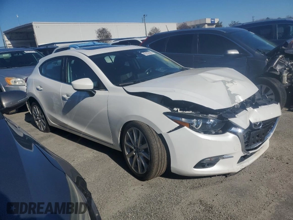 2017 Mazda 3 Grand Touring z VIN 3MZBN1M31HM138804, wystawiony jako Copart lot #45202295 z przebiegiem 80 428 mil mil oraz Szkoda całkowita • Salvage title. Historia ofert i sprzedaży dostępna na DreamBid. Obrazek 4.