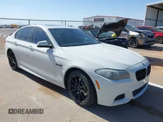 2013 BMW 5 Series 528i with VIN WBAXG5C56DD230121, listed as a IAAI auction lot 42019899 with 142,100 mi miles and . Bid and sale history available at carsss.com. Image 1.