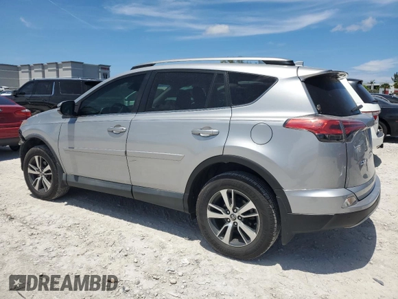 2018 Toyota RAV4 XLE with VIN 2T3WFREV7JW423768, listed as a Copart auction lot 61841875 with 111,991 mi miles and Salvage title. Bid and sale history available at DreamBid. Image 2.