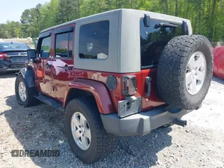 2007 Jeep Wrangler Unlimited Sahara with VIN 1J4GA59187L116585, listed as a IAAI auction lot 41996297 with 151,961 mi miles and . Bid and sale history available at DreamBid. Image 3.