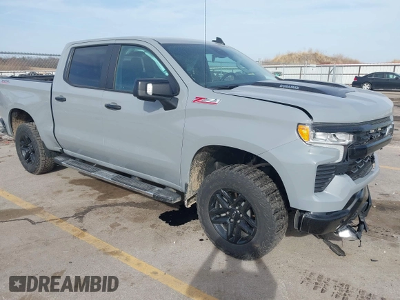 2024 Chevrolet Silverado 1500 LT Trail Boss with VIN 3GCUDFE83RG314063, listed as a IAAI auction lot 41824385 with 14,164 mi miles and . Bid and sale history available at DreamBid. Image 1.