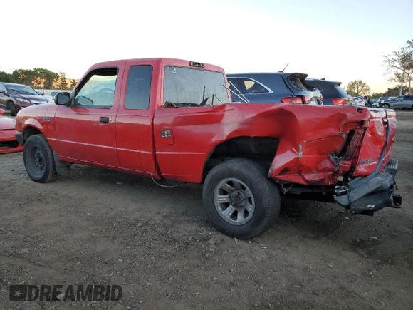 1999 Ford Ranger XL with VIN 1FTYR14C7XPA00551, listed as a Copart auction lot 79319814 with 294,635 mi miles and Salvage title. Bid and sale history available at DreamBid. Image 2.