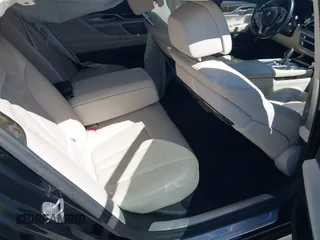 2018 BMW 7 Series 750i with VIN WBA7F0C54JGM22900, listed as a IAAI auction lot 41673673 with 66,264 mi miles. Bid and sale history available at carsss.com. Image 8.