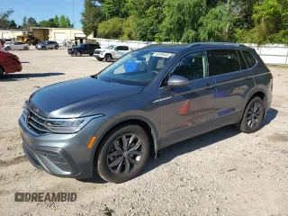 2023 Volkswagen Tiguan SE with VIN 3VVMB7AX1PM008200, listed as a Copart auction lot 58009045 with 31,585 mi miles and Salvage title. Bid and sale history available at DreamBid. Image 1.