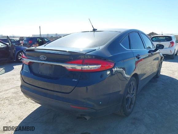 2018 Ford Fusion SE with VIN 3FA6P0H77JR180057, listed as a IAAI auction lot 41729451 with 122,200 mi miles. Bid and sale history available at carsss.com. Image 4.