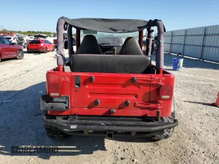 1999 Jeep Wrangler SE with VIN 1J4FY29P8XP483909, listed as a Copart auction lot 48679555 with 168,708 mi miles and Salvage title. Bid and sale history available at DreamBid. Image 6.