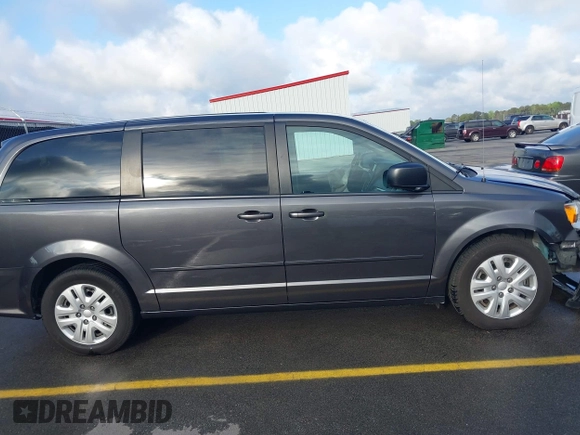 2017 Dodge Grand Caravan SE with VIN 2C4RDGBG3HR865948, listed as a IAAI auction lot 41916859 with 137,448 mi miles and . Bid and sale history available at DreamBid. Image 14.