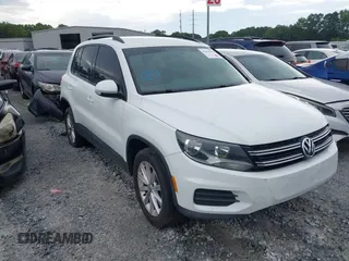 2017 Volkswagen Tiguan S with VIN WVGAV7AX1HK043848, listed as a IAAI auction lot 42639894 with 82,655 mi miles and . Bid and sale history available at DreamBid. Image 1.