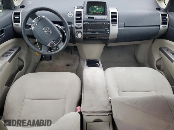2007 Toyota Prius с VIN JTDKB20U277635241, выставлен на аукционе Copart как лот 47685915 с пробегом 273 385 миль миль и Чистый • Clean title. История ставок и продаж доступна на DreamBid. Изображение 8.