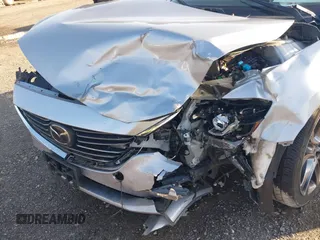 2017 Mazda 6 Grand Touring with VIN JM1GL1W50H1132261, listed as a IAAI auction lot 41930610 with 54,431 mi miles and . Bid and sale history available at DreamBid. Image 6.