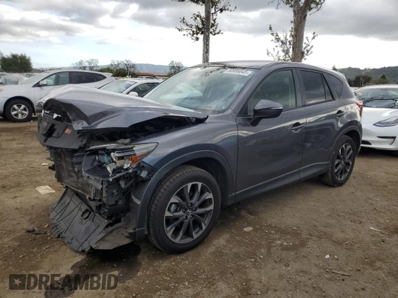 2016 Mazda CX-5 Grand Touring with VIN JM3KE2DY4G0795271, listed as a Copart auction lot 50986845 with 92,323 mi miles and Salvage Title. Bid and sale history available at carsss.com. Image 1.