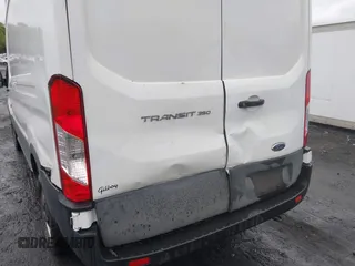 2021 Ford Transit Cargo with VIN 1FTBW1X84MKA98047, listed as a IAAI auction lot 42313747 with 65,600 mi miles and . Bid and sale history available at DreamBid. Image 6.