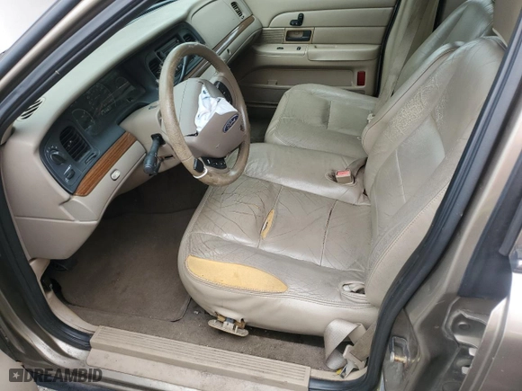 2005 Ford Crown Victoria LX with VIN 2FAFP74W95X126417, listed as a Copart auction lot 73537004 with 246,163 mi miles and Salvage Title. Bid and sale history available at carsss.com. Image 7.