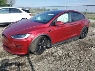 2023 Tesla Model X z VIN 7SAXCDE52PF431276, wystawiony jako Copart lot #55833825 z przebiegiem 17 974 mil mil oraz Szkoda całkowita • Salvage title. Historia ofert i sprzedaży dostępna na DreamBid. Obrazek 1.
