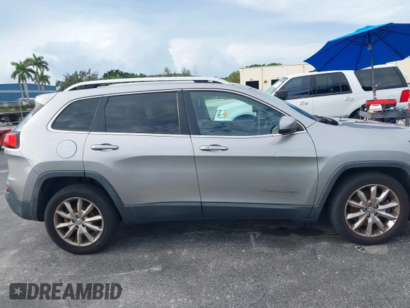 2016 Jeep Cherokee Limited with VIN 1C4PJLDB5GW164781, listed as a IAAI auction lot 42806344 with 137,283 mi miles and . Bid and sale history available at DreamBid. Image 13.