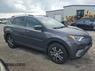 2017 Toyota RAV4 LE with VIN 2T3BFREV4HW591330, listed as a Copart auction lot 64726745 with 93,909 mi miles and Salvage title. Bid and sale history available at DreamBid. Image 4.