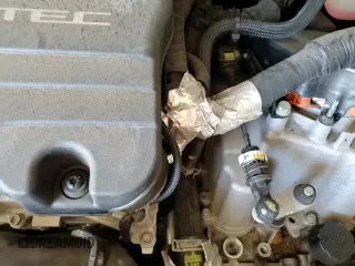 2018 Chevrolet Volt LT z VIN 1G1RC6S50JU127098, wystawiony jako Copart lot #84020015 z przebiegiem 116 451 mil mil oraz Szkoda całkowita • Salvage title. Historia ofert i sprzedaży dostępna na DreamBid. Obrazek 15.