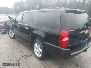 2012 Chevrolet Suburban LTZ with VIN 1GNSKKE74CR221161, listed as a IAAI auction lot 41543212 with 307,235 mi miles. Bid and sale history available at carsss.com. Image 3.