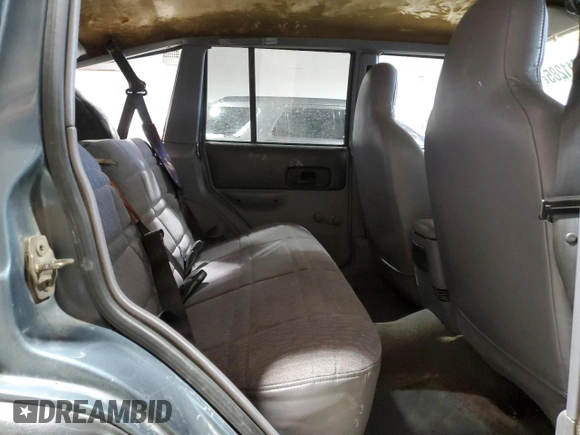 1997 Jeep Cherokee Sport with VIN 1J4FJ68S4VL532609, listed as a Copart auction lot 46711285 with 273,930 mi miles and Salvage Title. Bid and sale history available at carsss.com. Image 11.