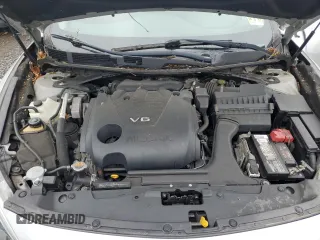 2016 Nissan Maxima SV z VIN 1N4AA6AP1GC431011, wystawiony jako Copart lot #56824955 z przebiegiem 103 668 mil mil oraz Szkoda całkowita • Salvage title. Historia ofert i sprzedaży dostępna na DreamBid. Obrazek 11.