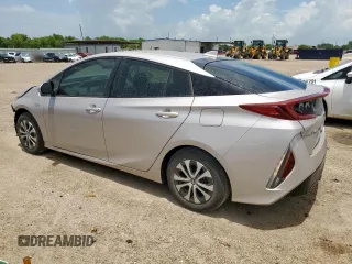 2021 Toyota Prius LE z VIN JTDKAMFP8M3177157, wystawiony jako Copart lot #63668045 z przebiegiem 44 760 mil mil oraz Czysty tytuł • Clean title. Historia ofert i sprzedaży dostępna na DreamBid. Obrazek 2.