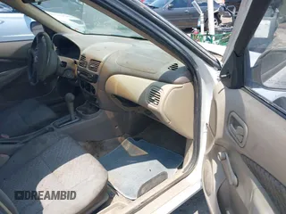 2003 Nissan Sentra XE z VIN 3N1CB51D83L696512, wystawiony jako IAAI lot #42454628 z przebiegiem 194 629 mil mil oraz . Historia ofert i sprzedaży dostępna na DreamBid. Obrazek 5.