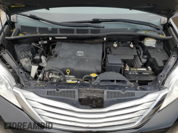 2015 Toyota Sienna XLE с VIN 5TDYK3DC6FS561960, выставлен на аукционе Copart как лот 59607355 с пробегом 110 593 миль миль и Списание • Salvage title. История ставок и продаж доступна на DreamBid. Изображение 12.