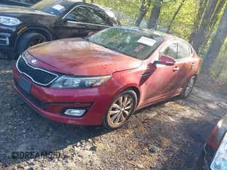 2015 Kia Optima EX with VIN 5XXGN4A70FG385182, listed as a IAAI auction lot 42005000 with 199,417 mi miles. Bid and sale history available at carsss.com. Image 2.