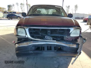 2003 Ford F-150 XL with VIN 1FTRX07L33KB73992, listed as a Copart auction lot 79565774 with 160,545 mi miles and Salvage title. Bid and sale history available at DreamBid. Image 5.