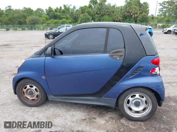 2013 Smart fortwo Pure with VIN WMEEJ3BA6DK664115, listed as a IAAI auction lot 42412198 with 64,522 mi miles and . Bid and sale history available at DreamBid. Image 14.