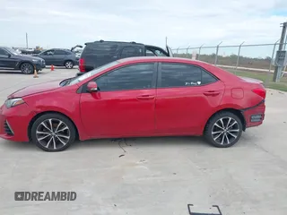 2017 Toyota Corolla L z VIN 5YFBURHE9HP610157, wystawiony jako IAAI lot #40999523 z przebiegiem 185 454 mil mil oraz . Historia ofert i sprzedaży dostępna na DreamBid. Obrazek 14.
