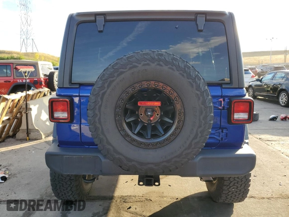 2020 Jeep Wrangler Unlimited Willys with VIN 1C4HJXDG0LW264742, listed as a Copart auction lot 73247804 with 31,745 mi miles and Salvage title. Bid and sale history available at DreamBid. Image 6.