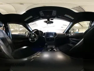 2018 Jeep Grand Cherokee Laredo E with VIN 1C4RJFAG7JC203793, listed as a IAAI auction lot 42585072 with 263,987 mi miles and . Bid and sale history available at DreamBid. Image 18.