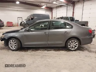 2011 Volkswagen Jetta SE with VIN 3VWDZ7AJXBM316686, listed as a IAAI auction lot 41218388 with 239,027 mi miles and . Bid and sale history available at DreamBid. Image 14.
